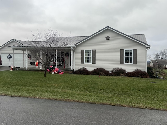 single story home featuring a front yard and a garage