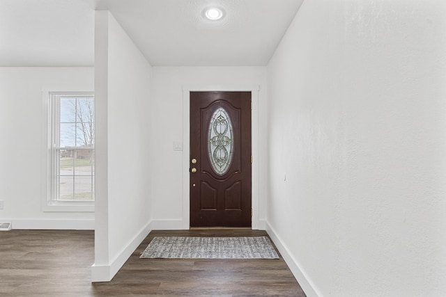 entryway featuring dark hardwood / wood-style floors