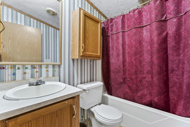 full bathroom with vanity, toilet, shower / bathtub combination with curtain, and a textured ceiling