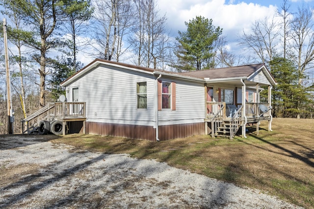 view of front of property featuring covered porch