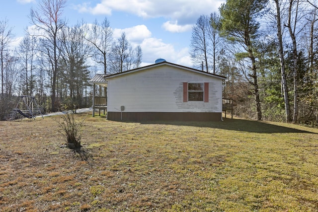 view of property exterior featuring a yard