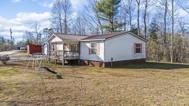 exterior space featuring a front yard and a porch