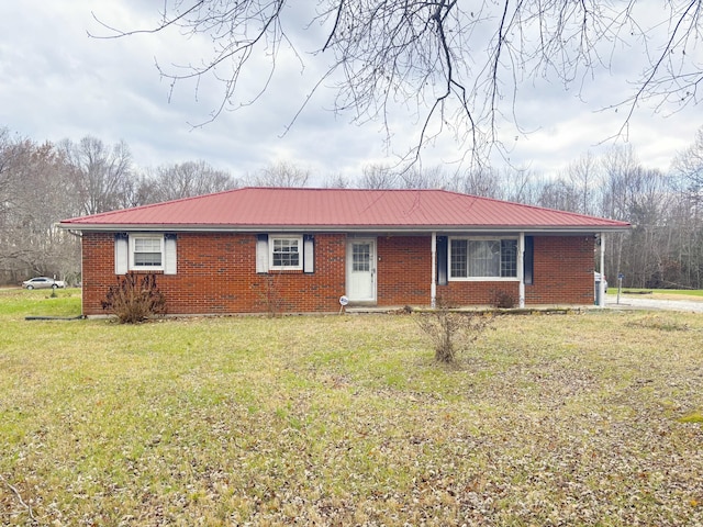 ranch-style home with a front lawn