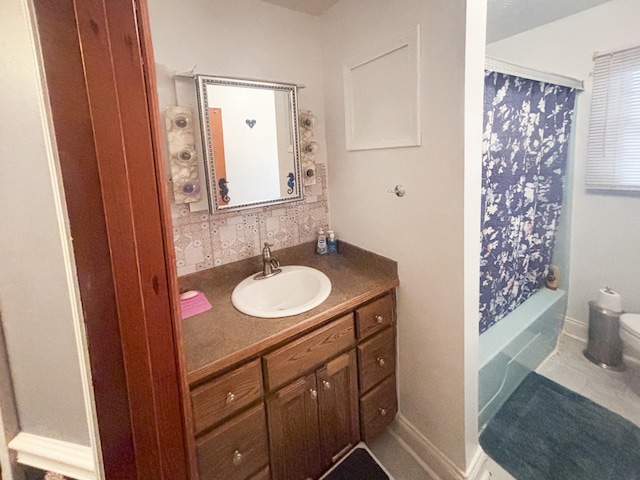 bathroom with tile patterned floors, vanity, and shower / bath combo