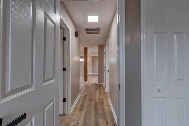 hallway featuring light wood-type flooring