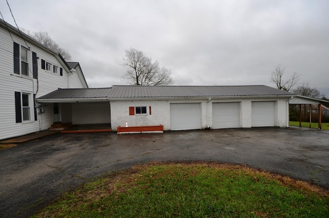 garage with a carport