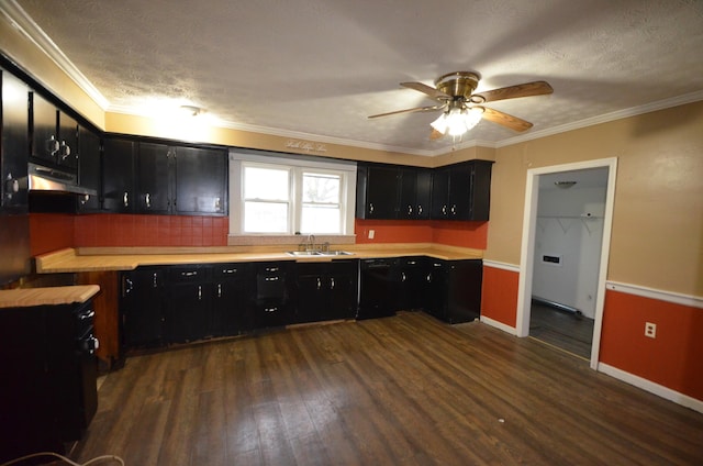 kitchen featuring ceiling fan, dishwasher, dark hardwood / wood-style flooring, crown molding, and a textured ceiling