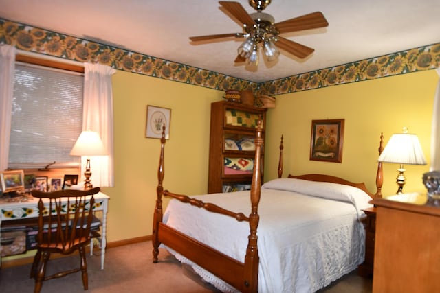 bedroom featuring ceiling fan and carpet floors