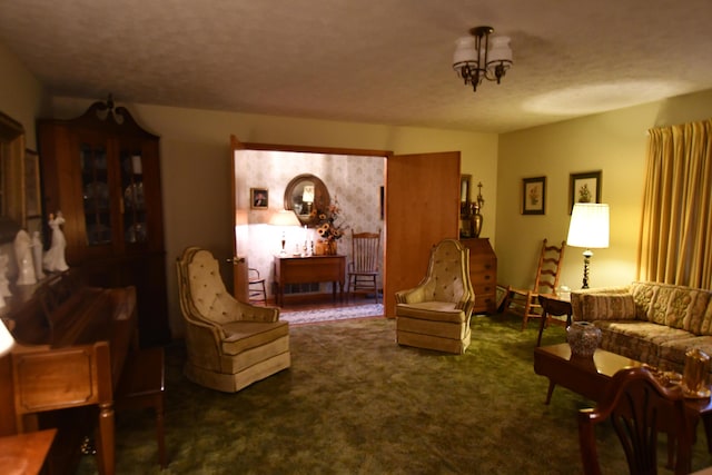 living room featuring dark colored carpet and a chandelier