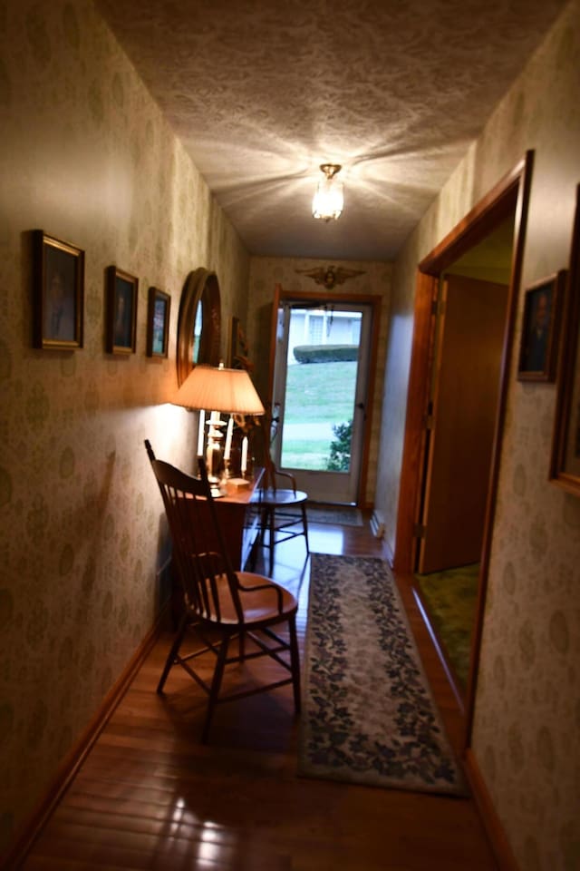 dining space with hardwood / wood-style flooring