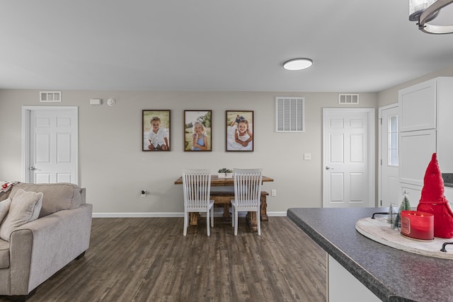 dining room featuring dark hardwood / wood-style floors