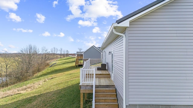 view of yard with a wooden deck