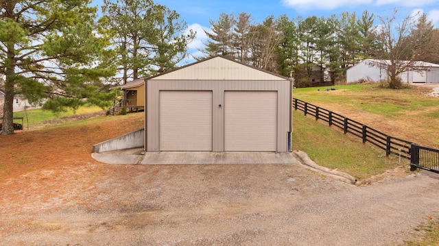 garage with a lawn