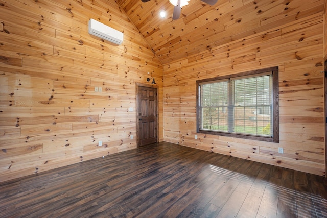 unfurnished room featuring a wall mounted AC and wood walls