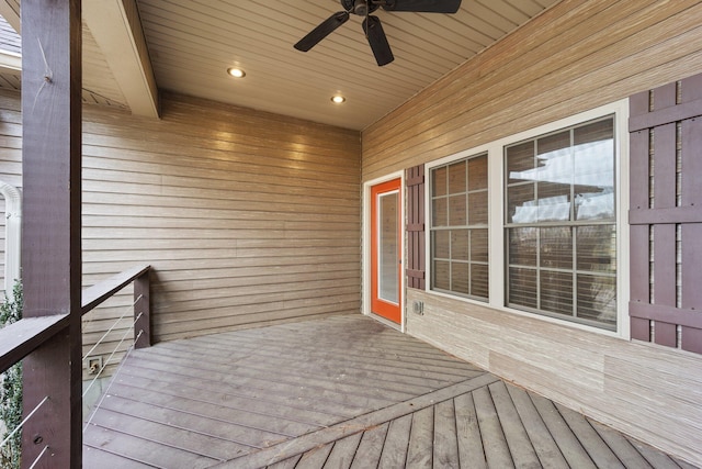 wooden deck with ceiling fan