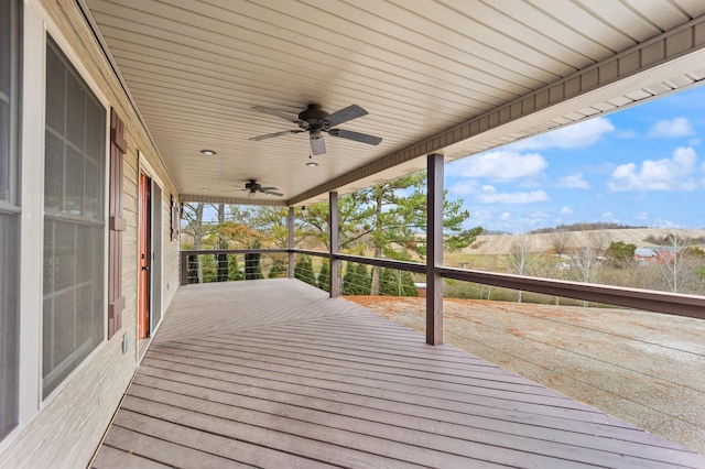 wooden deck with ceiling fan