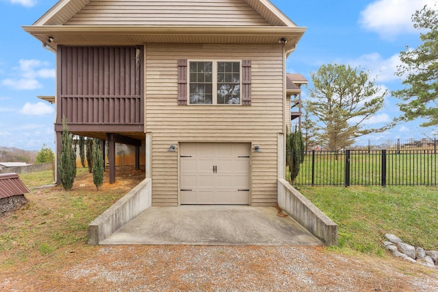 view of front of house with a front yard and a garage