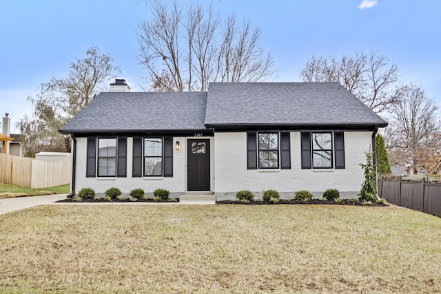 view of front of home with a front lawn