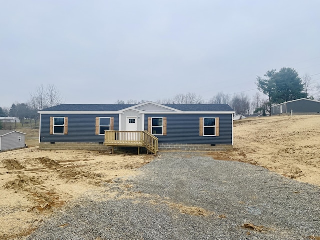 manufactured / mobile home featuring a deck