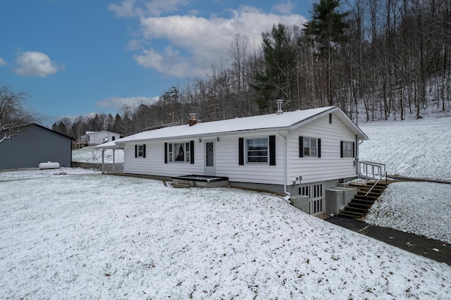 view of snow covered property