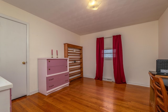 bedroom featuring light hardwood / wood-style flooring