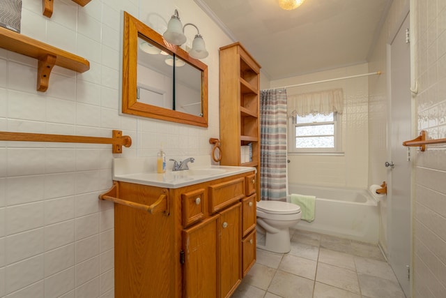 full bathroom featuring tile patterned flooring, vanity, shower / bath combination with curtain, and tile walls