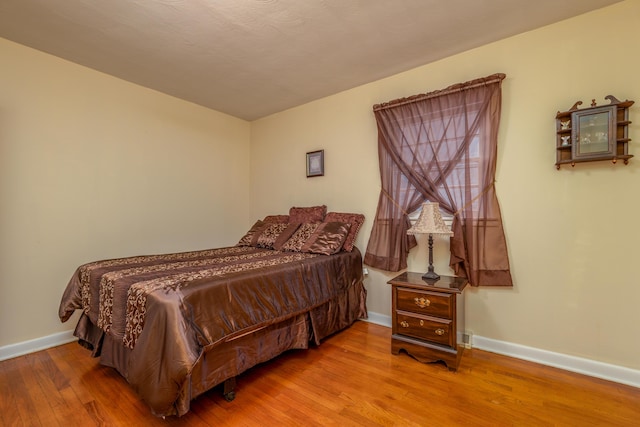 bedroom featuring light hardwood / wood-style floors