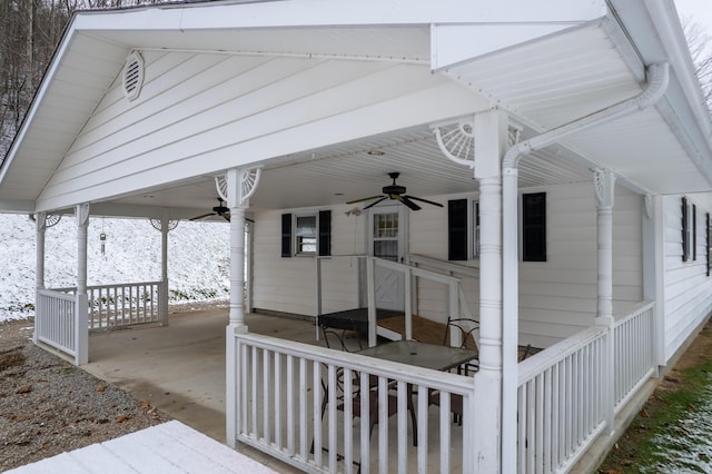 view of home's exterior with ceiling fan and a porch