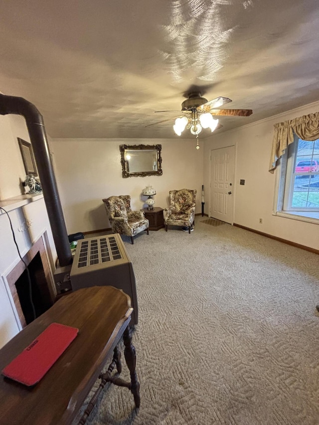 carpeted dining area with ceiling fan and a textured ceiling