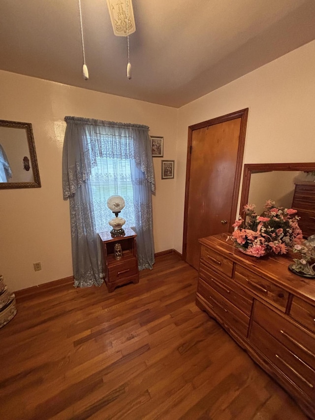 bedroom featuring dark hardwood / wood-style floors