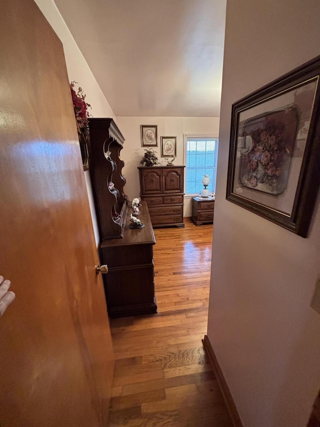 hall with light wood-type flooring