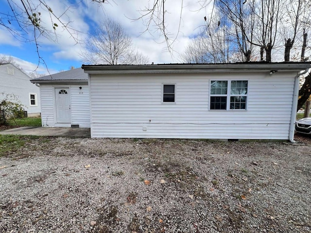 rear view of house with a patio