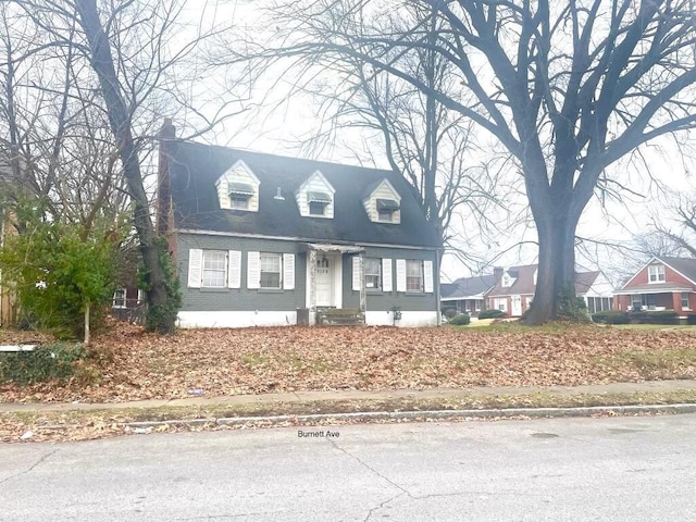 view of new england style home