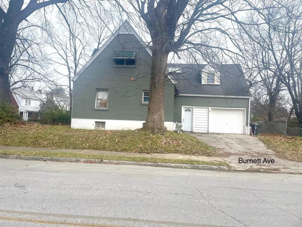 view of property exterior with a garage