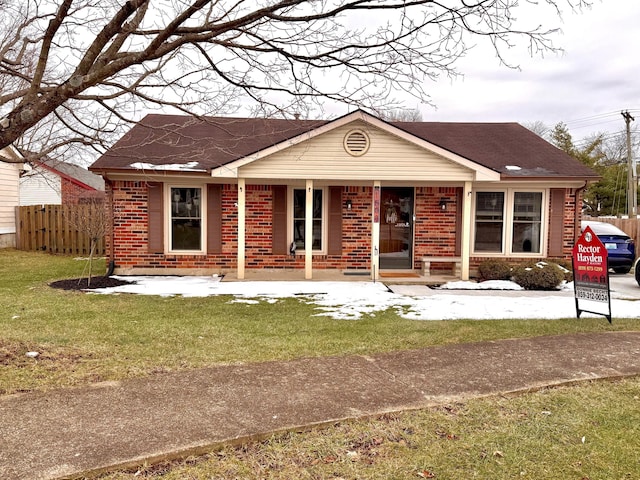 view of front of property with a front lawn