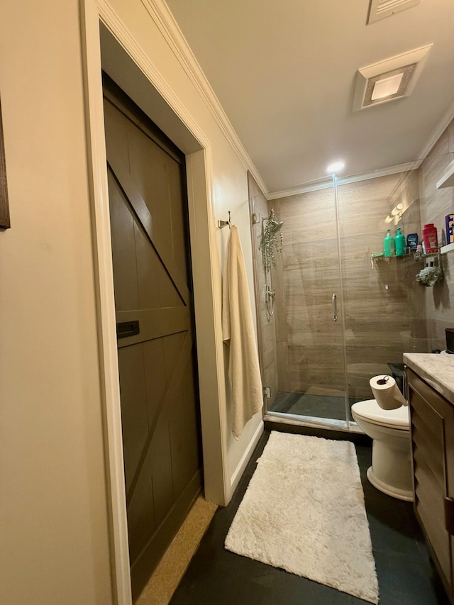 bathroom with vanity, a shower with shower door, ornamental molding, and toilet