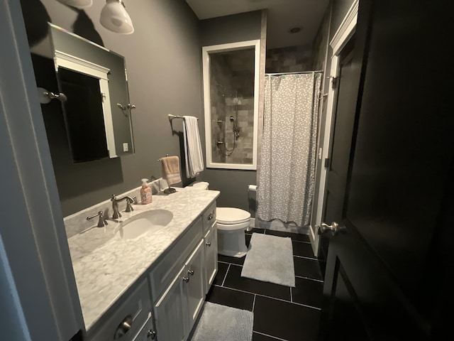 bathroom with walk in shower, tile patterned flooring, vanity, and toilet