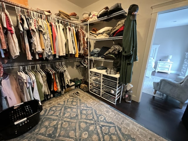 spacious closet featuring hardwood / wood-style floors