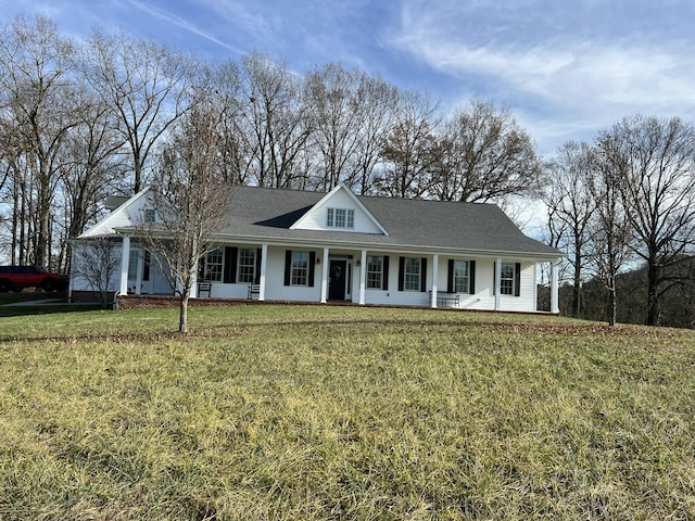 view of front of home with a porch and a front lawn