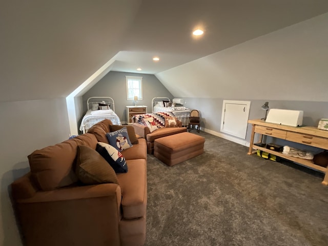 interior space with dark carpet and lofted ceiling