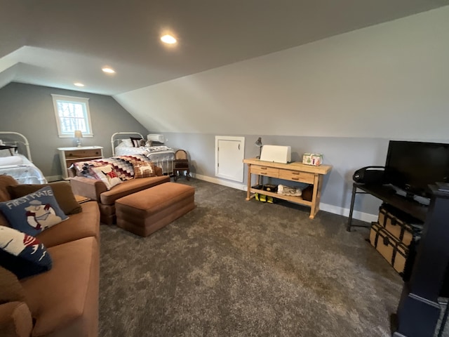 bedroom featuring dark colored carpet and lofted ceiling