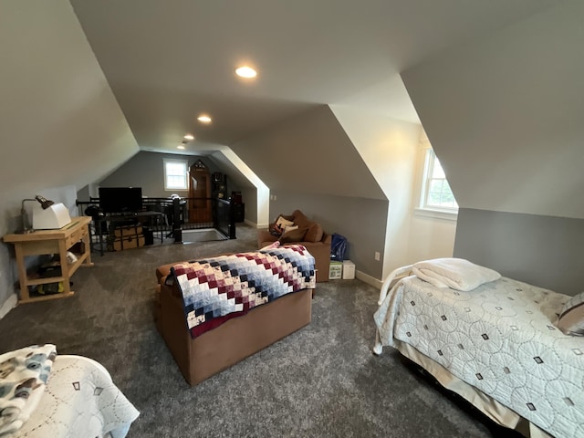 carpeted bedroom featuring lofted ceiling