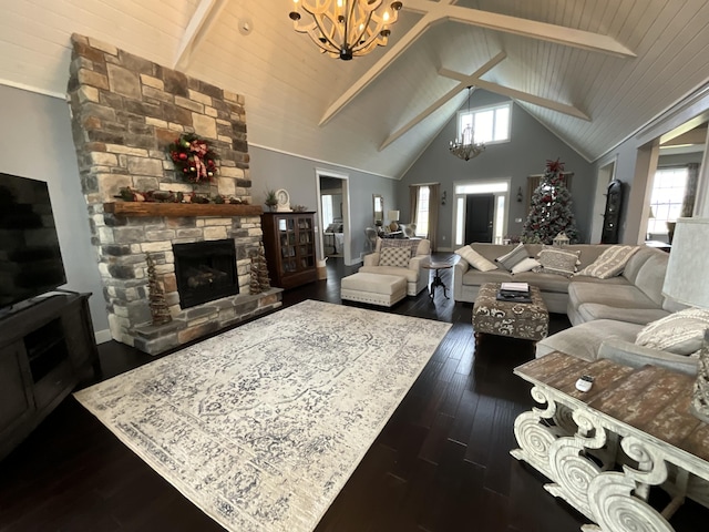 living room with a fireplace, dark hardwood / wood-style floors, a chandelier, and wooden ceiling