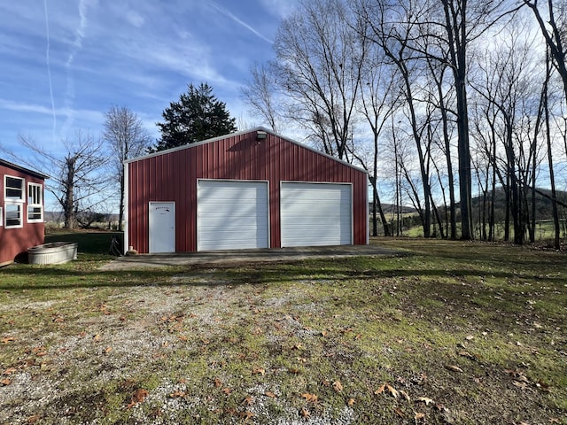 garage with a yard