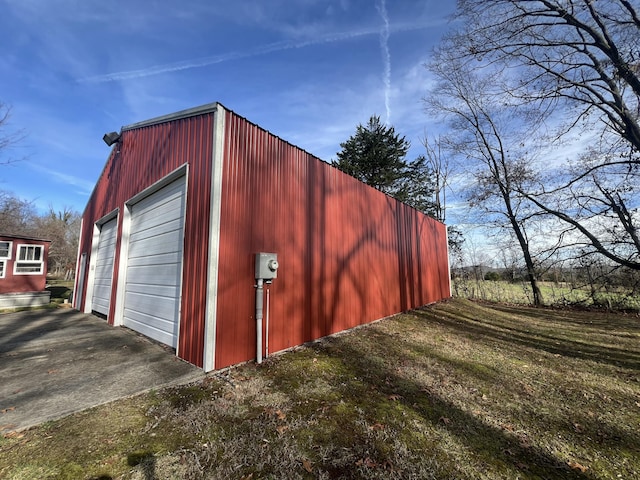 view of outbuilding with a garage