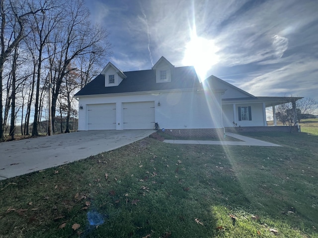 view of front facade with a front yard and a garage