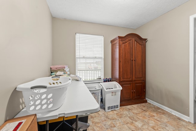 office area featuring a textured ceiling