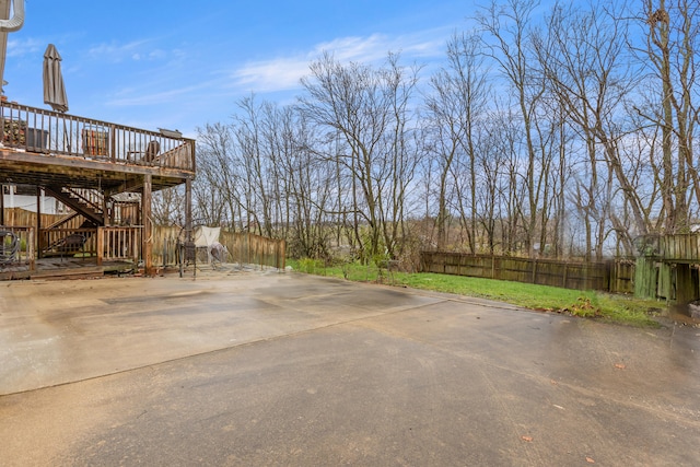 view of yard with a patio area and a deck