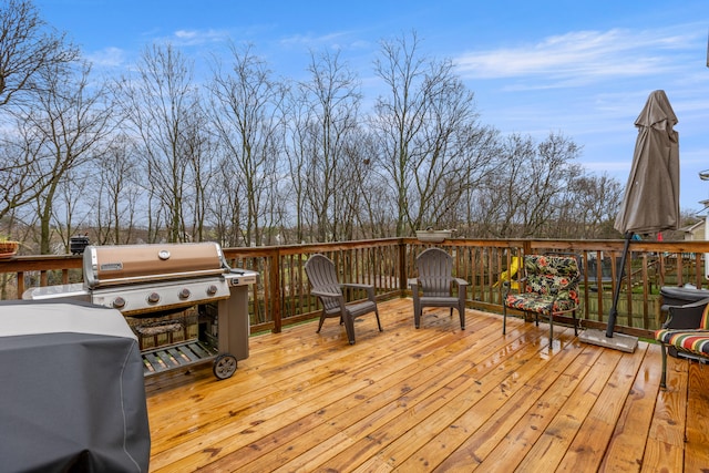 wooden terrace with area for grilling