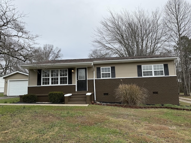 view of front of property with an outbuilding, a garage, and a front yard